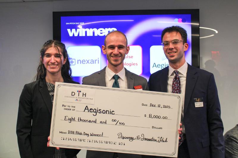 Aegisonic founders and designer posing with large ceremonial check.