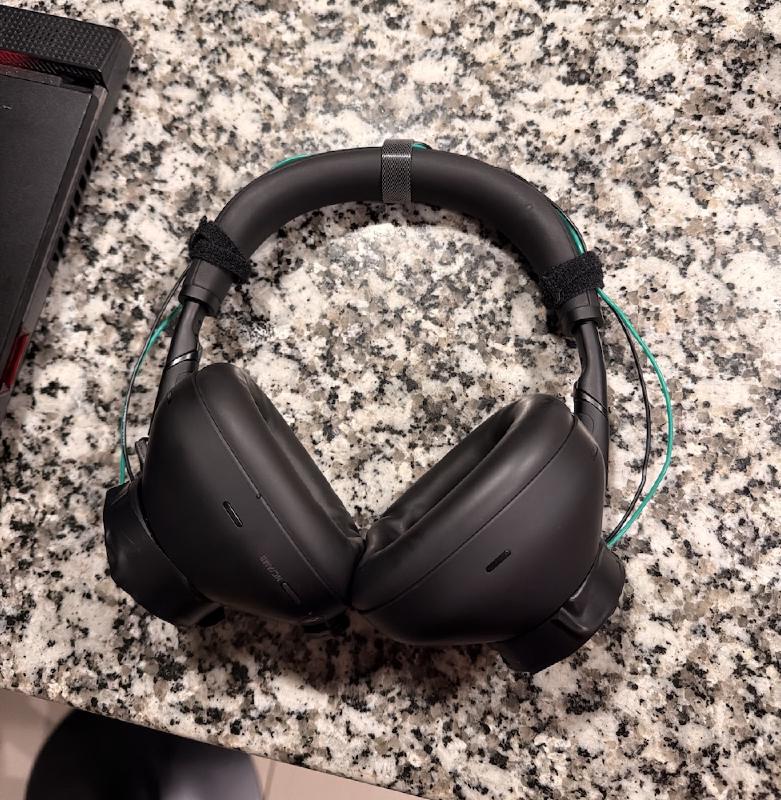 Black headphones representing the functional Aegisonic prototype.