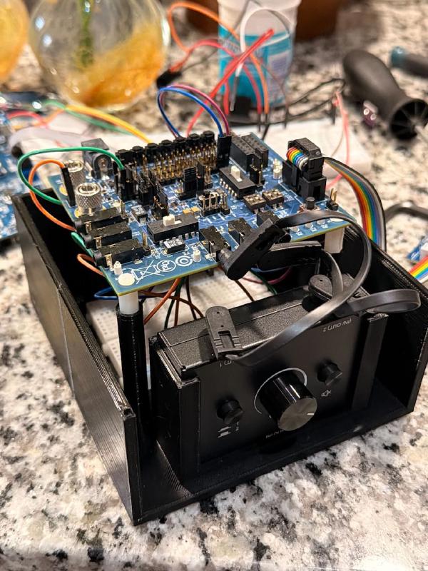 First Aegisonic prototype. Circuit board and audio dials within 3D-printed casing.